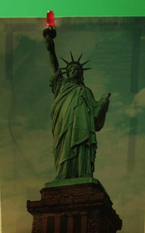 Hélène Martin's banner, representation of the statue of liberty with red led attached