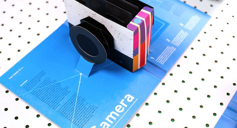 paper folded camera in book