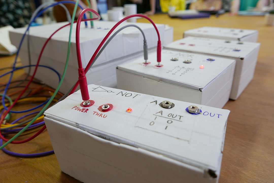 student projects, boxes with wires attached, representation of logic gates