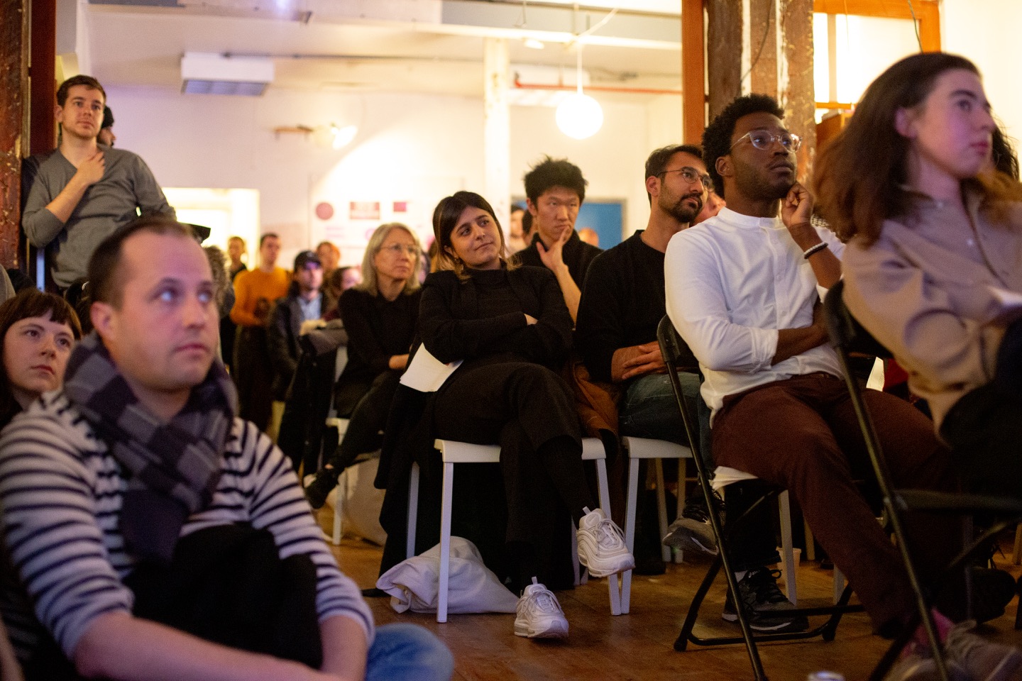 "Room full of people at SFPC seated and listening to Code Societies Winter 2019 student presentations."