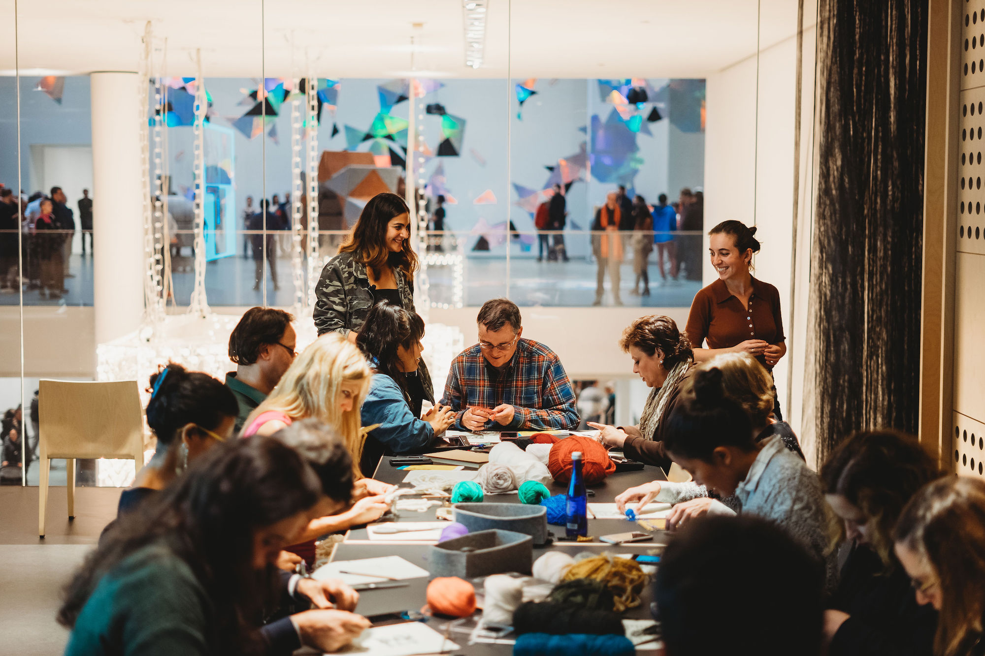 People working and talking at table